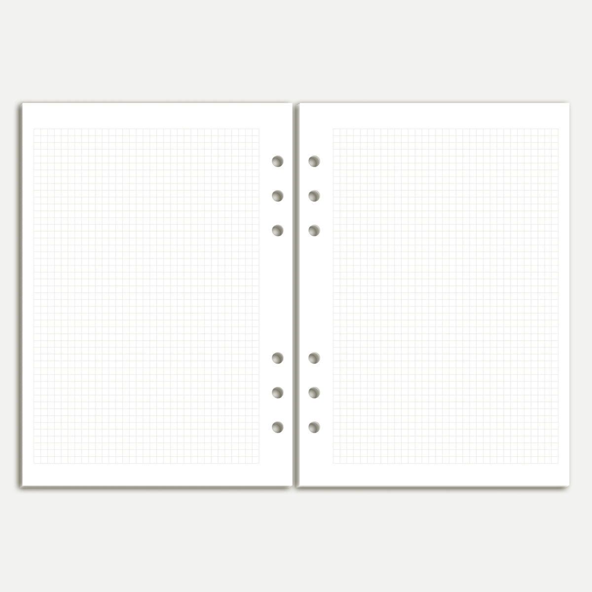 Two full grid notes pages from the 2027 horizontal weekly planner, A5 six-ring inserts