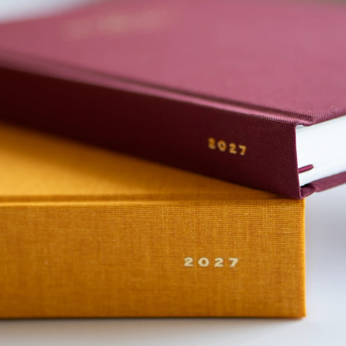 2027 Weekly Planner (Hardcover, Vertical, Heritage 120gsm) in Clementine #color_clementine