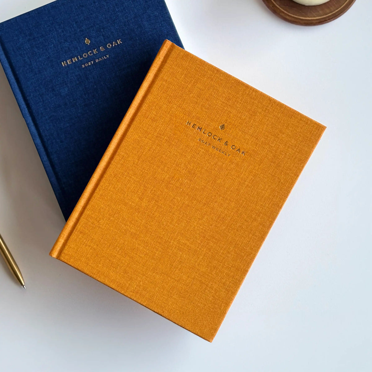 2027 Weekly Planner (Hardcover, Vertical, Heritage 120gsm) in Clementine #color_clementine