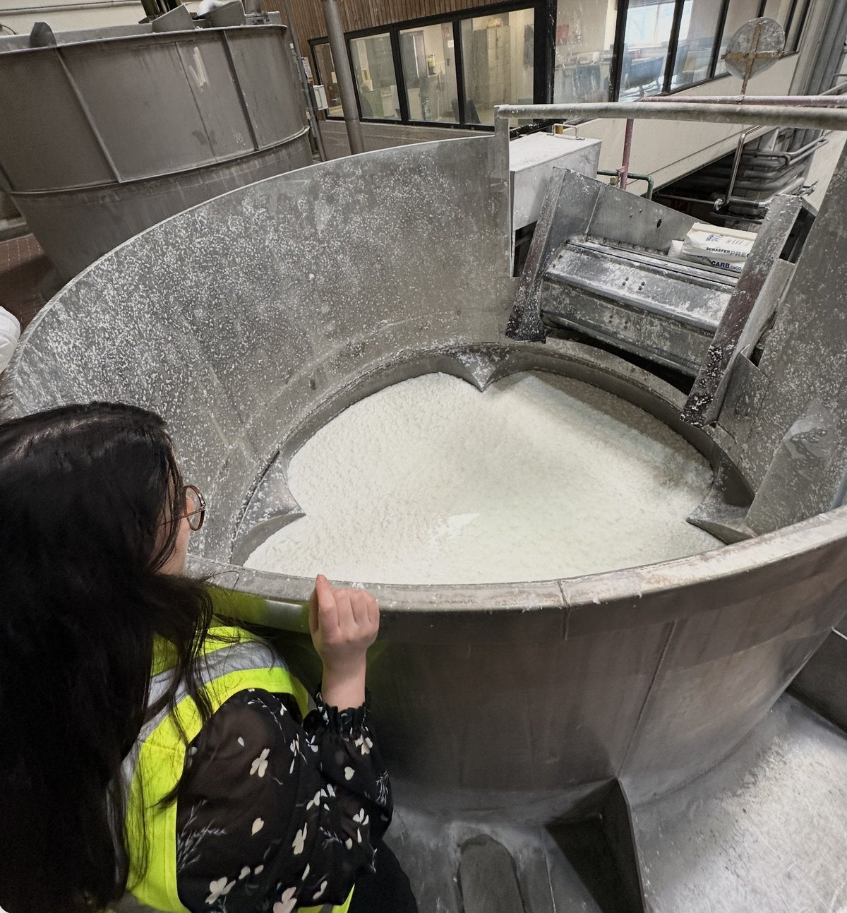 tia checking out the paper pulp before it gets turned into Archivist