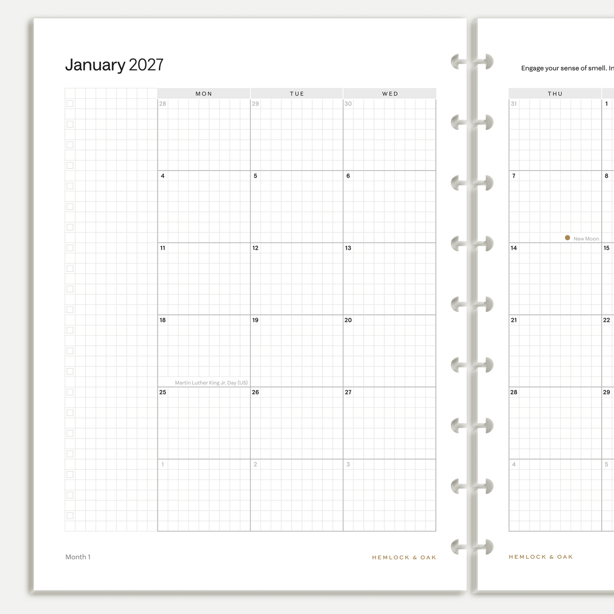 Close view of January 2027 monthly calendar inserts with grid writing space and nine-disc Classic HP punches